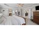 Spacious main bedroom featuring a fireplace and attached home office at 3420 Pleasant Springs Dr, Cumming, GA 30028