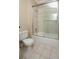 Tiled bathroom featuring a shower and tub with sliding glass doors at 3541 Roswell Ne Rd # 20, Atlanta, GA 30305