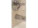 Detailed view of shower fixtures with chrome finish, highlighting modern bathroom design at 3541 Roswell Ne Rd # 20, Atlanta, GA 30305