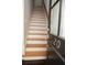 The home features a staircase with wood treads and a sleek handrail at 3541 Roswell Ne Rd # 20, Atlanta, GA 30305