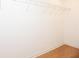 Bright walk-in closet with wire shelving and wood floor for organized storage at 3541 Roswell Ne Rd # 20, Atlanta, GA 30305