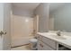 Bathroom features a shower-tub, toilet, and vanity with sink at 1464 Claredon Dr, Lawrenceville, GA 30043