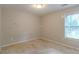 Bedroom bathed in natural light, providing a blank canvas ready to be personalized and styled to one's taste at 1464 Claredon Dr, Lawrenceville, GA 30043