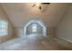 Large bonus room with a vaulted ceiling and a big window at 1464 Claredon Dr, Lawrenceville, GA 30043