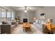 Comfortable living room with stylish sofas, a fireplace, and bright natural lighting at 1464 Claredon Dr, Lawrenceville, GA 30043