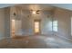 Large bedroom with a high ceiling and lots of space at 1464 Claredon Dr, Lawrenceville, GA 30043
