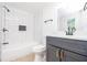 Modern bathroom with white subway tile, a stylish vanity, and upgraded fixtures at 2935 Catalina Dr, Decatur, GA 30032