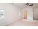 Spacious bedroom with neutral carpet and white walls, enhanced by natural light at 2935 Catalina Dr, Decatur, GA 30032