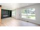 Open living room with luxury vinyl flooring and a sleek entertainment center at 2935 Catalina Dr, Decatur, GA 30032