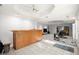 Finished basement with a custom bar, tiled flooring, and extra living space at 5204 Tealing Ne Dr, Roswell, GA 30075