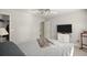 This is a bedroom with neutral walls, a ceiling fan, and an open closet at 5204 Tealing Ne Dr, Roswell, GA 30075