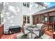 Outdoor deck shows seating and screened-in porch attached to the home's exterior at 5204 Tealing Ne Dr, Roswell, GA 30075