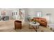 Inviting living area showcasing an open floor plan, hardwood floors, and a cozy seating arrangement at 5204 Tealing Ne Dr, Roswell, GA 30075