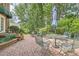 Outdoor patio area with greenery and seating, perfect for enjoying the backyard at 3196 Henderson Walk, Atlanta, GA 30340
