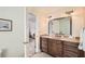 Bathroom vanity with sink and mirror at 3196 Henderson Walk, Atlanta, GA 30340
