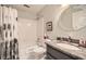 Updated bathroom featuring a granite countertop, white subway tile, and modern fixtures at 3196 Henderson Walk, Atlanta, GA 30340