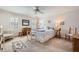 Bright and airy bedroom with neutral decor and two windows at 3196 Henderson Walk, Atlanta, GA 30340