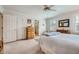 Spacious bedroom with neutral carpet, dresser, and natural light at 3196 Henderson Walk, Atlanta, GA 30340