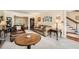 Spacious living room featuring a fireplace, plush seating, and classic furnishings at 3196 Henderson Walk, Atlanta, GA 30340