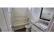 A clean bathroom features a granite counter, vanity, and tub with shower at 341 Brookside Dr, Mcdonough, GA 30253