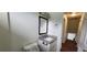 Half bathroom showcasing white vanity, granite counter, and lighting at 341 Brookside Dr, Mcdonough, GA 30253