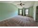 Large bedroom with high ceilings and two windows offering natural light at 5535 Bright Cross Way, Suwanee, GA 30024