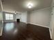 Spacious living room with hardwood floors, fireplace and ample natural light at 5535 Bright Cross Way, Suwanee, GA 30024