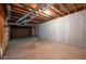 Unfinished basement area with concrete floor and exposed ceiling at 1096 Polo Club Nw Dr, Marietta, GA 30064
