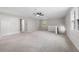 This bonus room features a large closet, a window, carpet, and light gray walls at 1096 Polo Club Nw Dr, Marietta, GA 30064