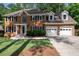 Beautiful brick home with a two-car garage and a well-maintained front yard at 1096 Polo Club Nw Dr, Marietta, GA 30064