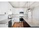 Beautiful kitchen features white cabinets, granite countertops, stainless steel appliances, and center island at 1096 Polo Club Nw Dr, Marietta, GA 30064