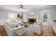 Sunlit living room showcasing a fireplace, natural light, and an inviting seating area at 1096 Polo Club Nw Dr, Marietta, GA 30064