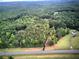 Secluded homesite nestled in a canopy of mature trees on a sprawling lot with great privacy at 12208 Buchanan Hwy, Temple, GA 30179