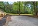 Home exterior showcasing spacious parking and a well-maintained lawn at 12208 Buchanan Hwy, Temple, GA 30179