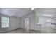 Bright living area with hardwood floors, stylish cabinets and a doorway to a laundry room at 12208 Buchanan Hwy, Temple, GA 30179