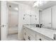 Updated bathroom with granite countertops, modern fixtures, large mirror, and a separate tub at 1731 Twin Brooks Se Dr, Marietta, GA 30067