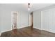 Bedroom with hardwood floors, featuring ensuite bathroom and closet at 1731 Twin Brooks Se Dr, Marietta, GA 30067
