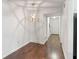 Dining area with hardwood floors and modern light fixture at 1731 Twin Brooks Se Dr, Marietta, GA 30067