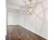 Dining area with hardwood floors and modern light fixture at 1731 Twin Brooks Se Dr, Marietta, GA 30067