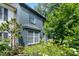 Exterior of a gray painted brick home with landscaped yard at 1731 Twin Brooks Se Dr, Marietta, GA 30067