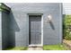 Close up of the gray front door and house number at 1731 Twin Brooks Se Dr, Marietta, GA 30067