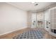 Bright and airy room with large windows and hardwood flooring and a bay window at 3519 Wellsley Dr, Powder Springs, GA 30127