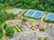 Aerial view of community sports facilities including playground, tennis, and basketball courts at 6460 Valley Crossing Way, Cumming, GA 30028