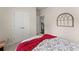 Well-lit bedroom showing door to hall and closet at 6460 Valley Crossing Way, Cumming, GA 30028