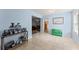 Welcoming entryway with blue walls, tile flooring, and open access to living areas at 6460 Valley Crossing Way, Cumming, GA 30028