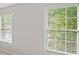 Bright bedroom featuring two windows bringing plenty of natural light at 740 Orchard Ct, Atlanta, GA 30328