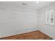 Bright closet has wooden floors and multiple wire racks at 740 Orchard Ct, Atlanta, GA 30328