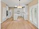 Modern kitchen with white cabinetry, stainless steel appliances, and center island at 740 Orchard Ct, Atlanta, GA 30328