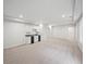 Spacious living room with wet bar and neutral carpet at 740 Orchard Ct, Atlanta, GA 30328