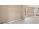 Bright, carpeted living area with large windows at 740 Orchard Ct, Atlanta, GA 30328